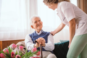 arkansas pass home care provider helping elderly man