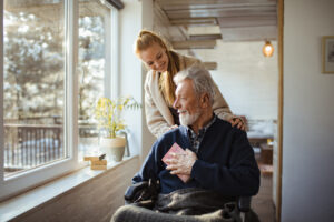 port aransas home care provider helping elderly man in wheelchair