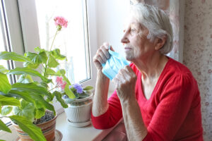 elderly woman feeling the effects of social isolation